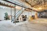 This basement has 12 foot ceilings and 2 staircases.