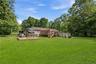 Expansive green lawn providing ample outdoor space