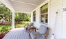 Wooden deck featuring covered porch