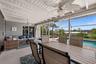 Large shaded lanai steps from the pool
