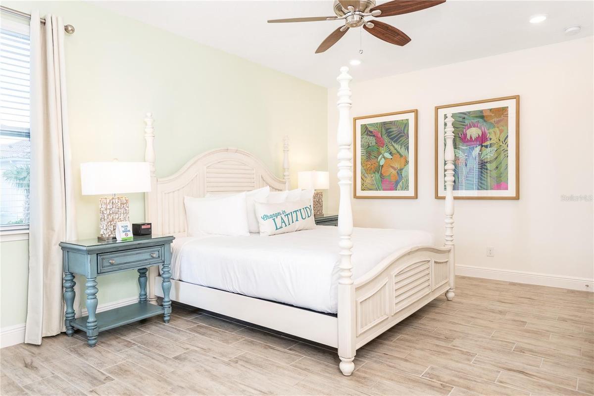 Primary bedroom retreat with spacious layout in Margaritaville Resort Orlando near Disney