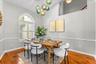 Dining room with custom light fixture
