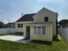 Back of house with a patio, a fenced backyard, and roof with shingles