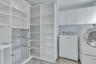Laundry room with cabinet space and washer and dryer