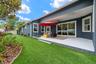 Covered outdoor living seamlessly extends the home