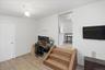 Office space featuring ceiling fan and light wood-style floors