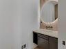 Half bathroom near entrance