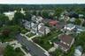 Established neighborhood with a mix of architectural styles, mature trees, and residential streets