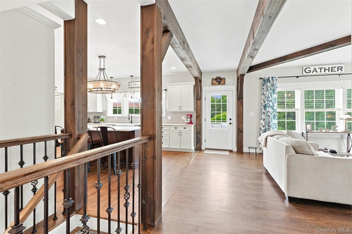 Rich hardwood floors and handsome wood detail throughout the home