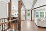 Rich hardwood floors and handsome wood detail throughout the home