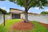 Fenced yard space, 2-car rear facing garage.