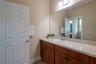 Bedrooms 2 and 3 share the Jack and Jill bath.