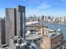 Property's view of city featuring a water view