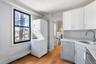2nd Floor Apartment Kitchen w/ stackable washer and dryer