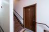 Tiled foyer entrance featuring stairway