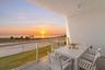 Completed in October 2023, this luxury 3rd-floor unit offers unobstructed beach and Gulf views from its spacious private balcony, providing an excepti