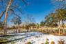 View of yard layered in snow