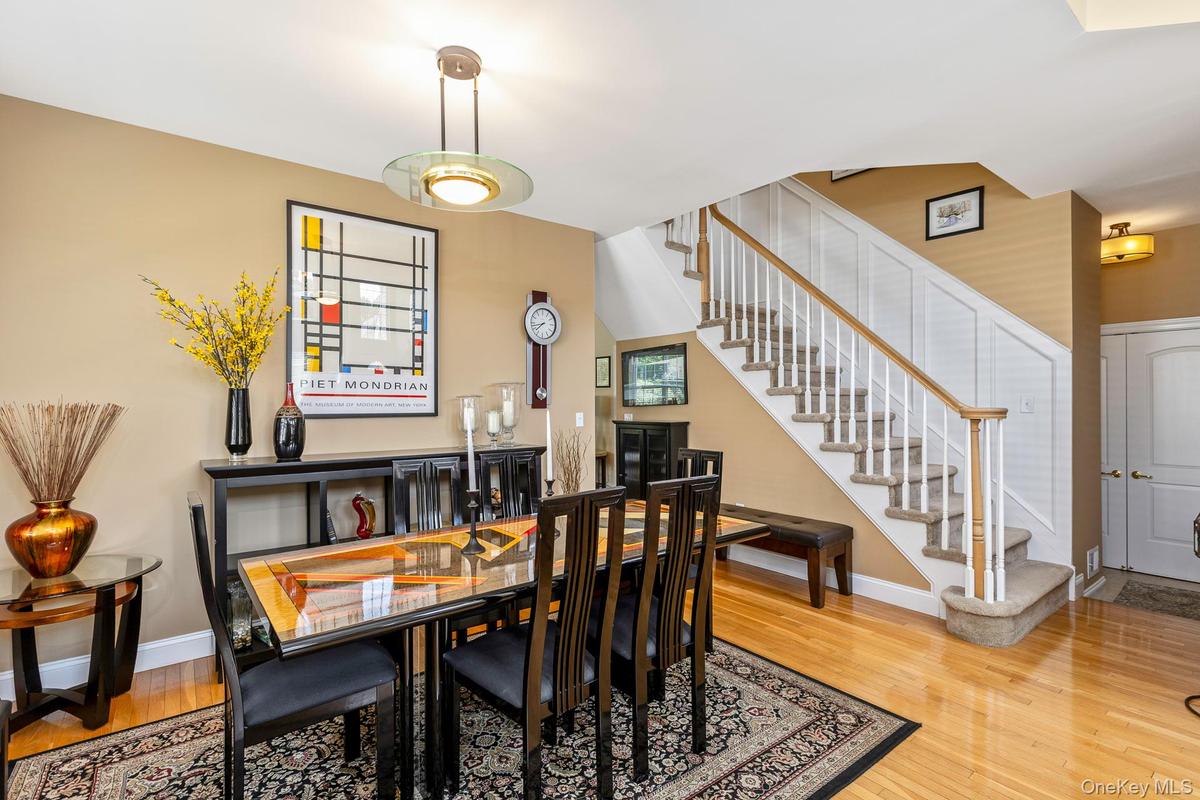 Dining area, featuring a contemporary chandelier