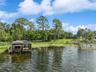 Boat house with electric cover and screened in room