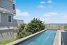 Pool featuring a water view