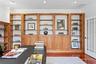 Bespoke floor-to-ceiling built-ins in the Office/Library offer both a striking visual statement & unparalleled storage