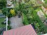 Backyard with covered terrace  & basketball hoop
