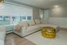 Living room featuring light hardwood / wood-style floors and baseboard heating