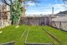 View of fenced backyard