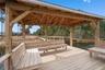 Custom oversized built-in dock benches were thoughtfully designed for lounging, relaxing and taking in the peaceful waterfront views.