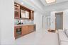Second-Floor Sitting Area with Wet Bar and Wine Cooler – Perfect for Entertaining