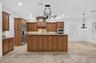 Spacious Kitchen with ample cabinetry and a Walk-In Pantry