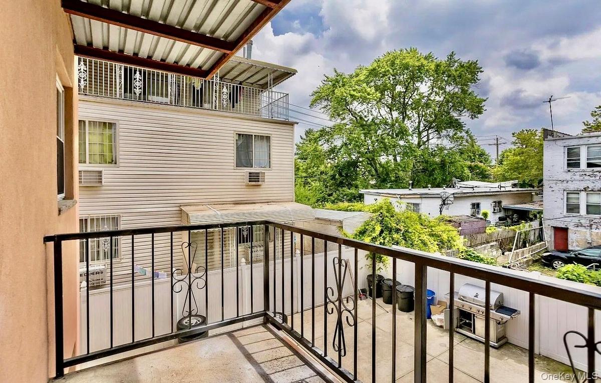 Private balcony with wrought iron railing