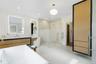 Full bathroom with a soaking tub, vanity, a shower stall, recessed lighting, and concrete floors