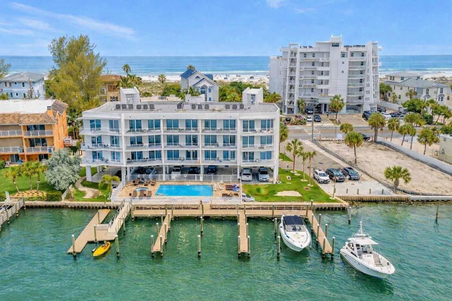 Completed in 2018, Oceana East showcases contemporary coastal architecture with clean lines, elevated construction, expansive balconies, and modern en