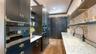 Custom butler’s pantry with marble counters