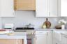 Open Gourmet Kitchen With Marble Countertops