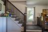Beautiful front and rear staircases brings the charm and character of this historic Craftsman home together. The back stairs come from the bedrooms to