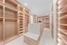 Spacious Primary Walk-In Closet