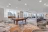 Rec room featuring pool table, recessed lighting, and a view of city