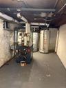Utilities featuring gas water heater and water heater