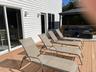 Wooden deck featuring an outdoor living space and a gazebo