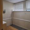 Unfurnished room featuring a paneled ceiling and wood finished floors
