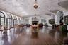 Ballroom with original plaster ceilings and fireplace