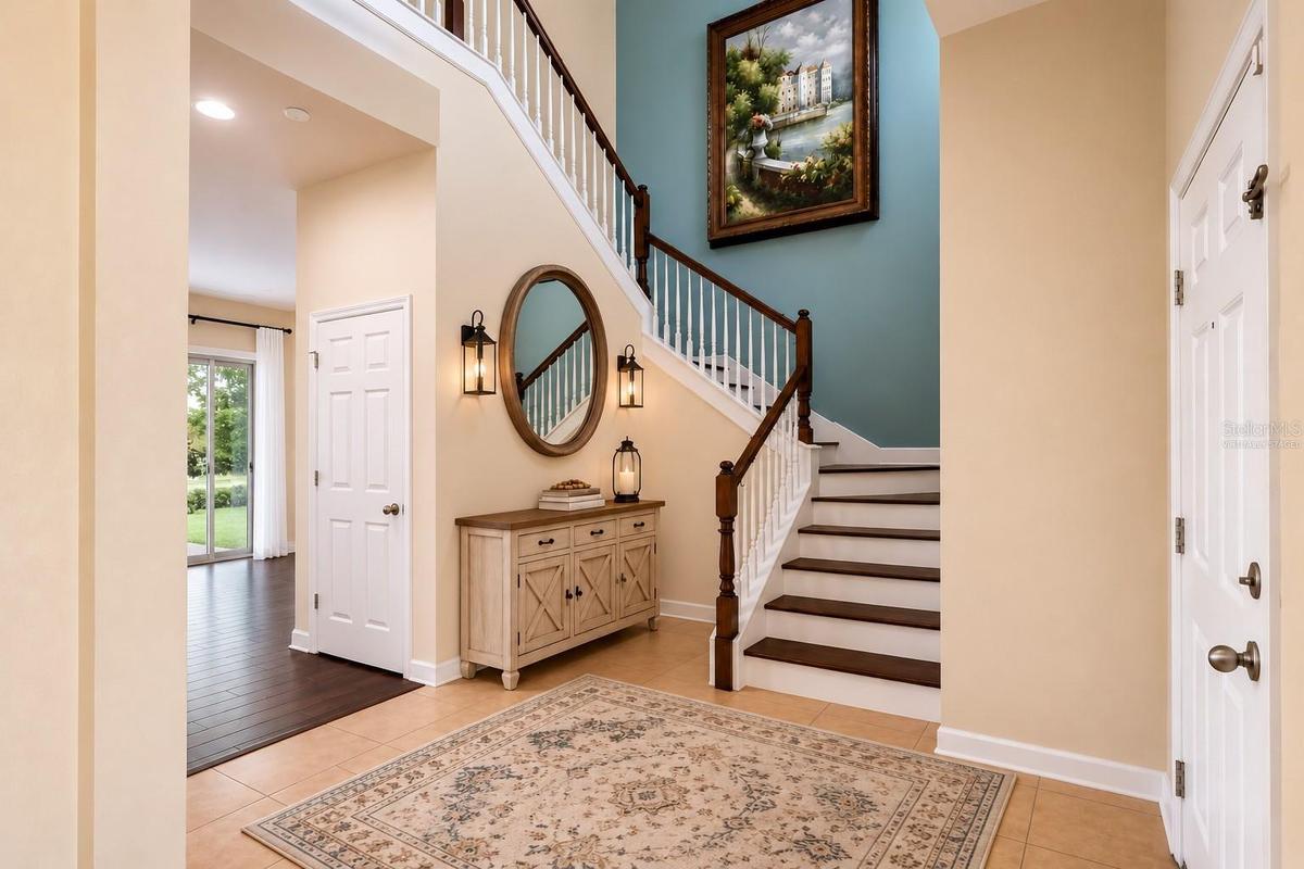 Foyer virtually staged with decor.