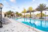 MAIN COMMUNITY POOL WITH SEPARATE JACUZZI ON THE LAKE NEXT TO FANTASTIC CLUBHOUSE WITH KITCHEN, GYM AND SITTING AREA