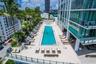 Resort-style bayfront pool deck at Biscayne Beach, Edgewater