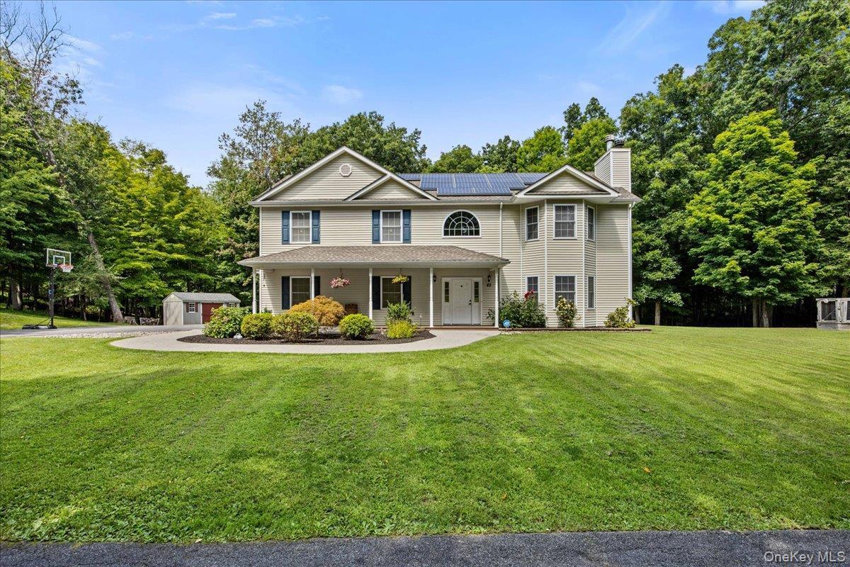 Your home is set back off the road with gorgeous landscaping.