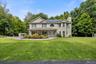 Your home is set back off the road with gorgeous landscaping.