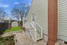 Fenced backyard with a storage shed