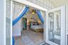 Private deck looking into Primary bedroom